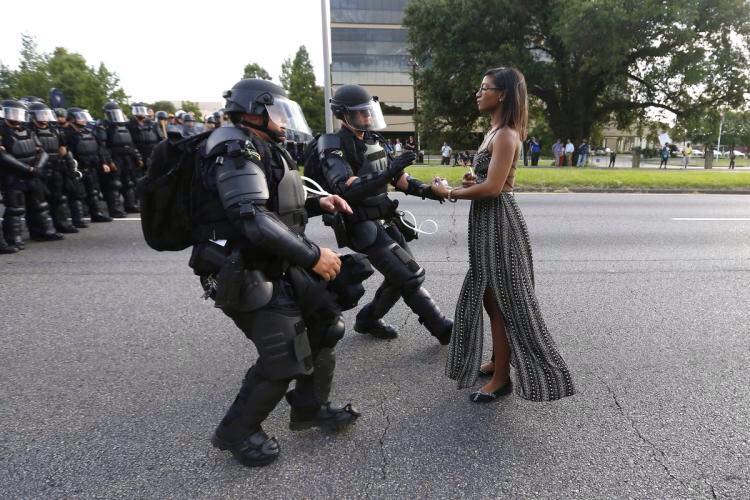 Photo by Jonathan Bachman. According to the Atlantic article from which I cadged this photo, a number of readers sided with the police.